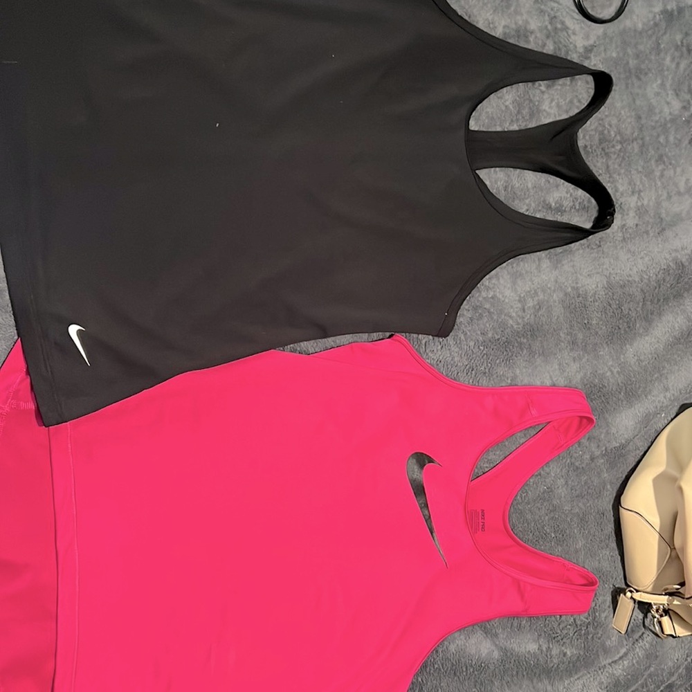 2 Nike t strap tanks
